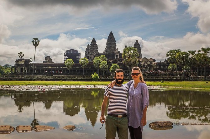 Sunset or sunrise bicycle tour around Angkor Wat and nearby temples - Ta Prohm, where trees claim the ruins
