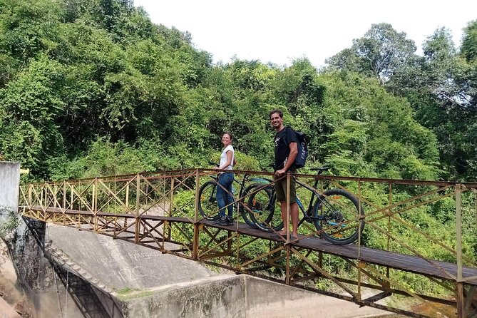 Sunset or sunrise bicycle tour around Angkor Wat and nearby temples - Angkor Thom and the Bayon’s stone faces
