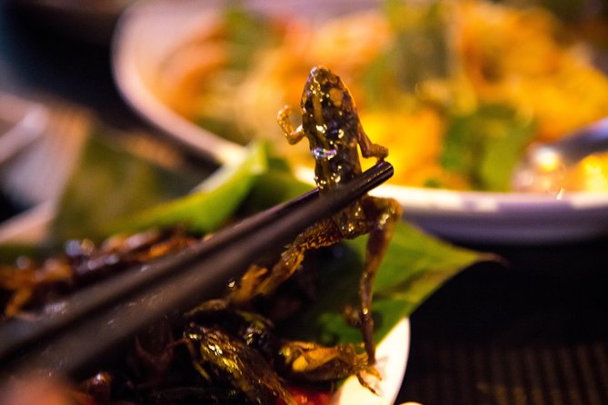 Ultimate Phnom Penh Food Tour by Tuk Tuk: 20 Tastings and Drinks - Wat Botum Park brings family cooking and cold drinks